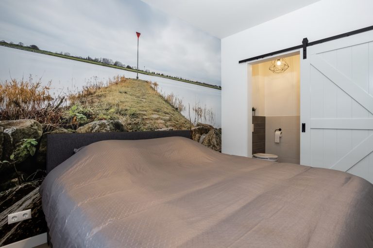 Slaapkamer wand appartement 2 van https://hoeveplexat.nl/